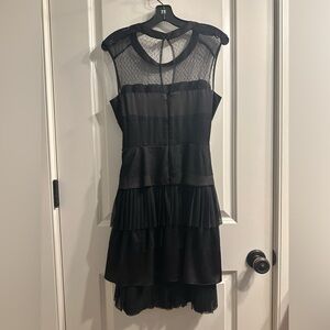 Black cocktail dress. Size 8. Like new. Worn once.